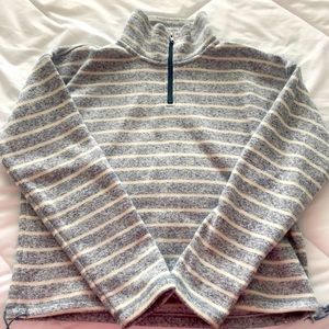 White and light blue turtleneck sweater